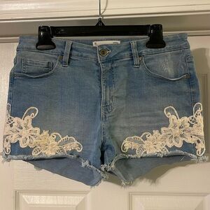 Eighty Two - medium wash blue jean shorts - lacy embroidery - size 11